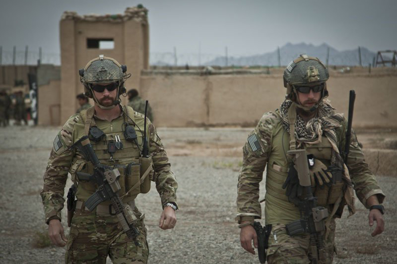 Soldiers wearing bulletproof vests and hard armor plates 